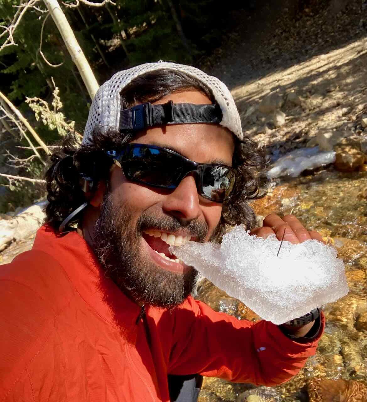 Anil eating spring snow near Thomas Creek Trail