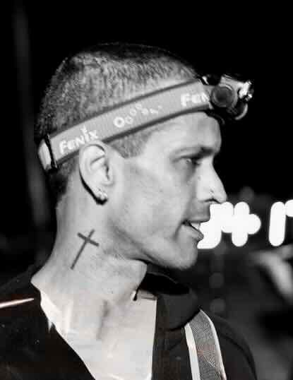 Side profile of Anil after a trail race finish